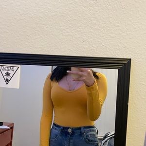 Mustard yellow body suit